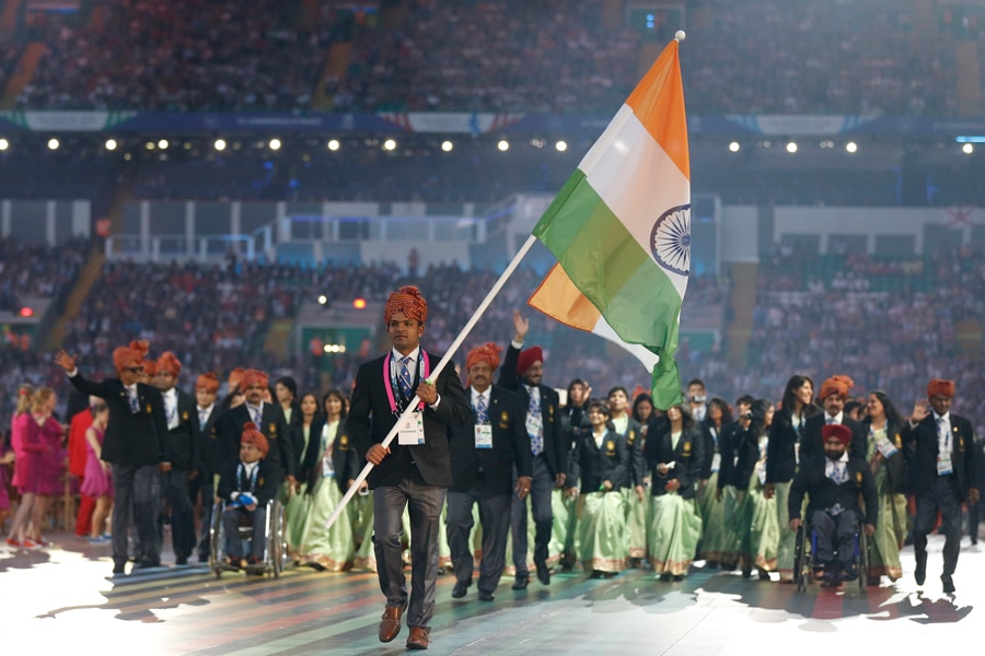 India’s flag bearer Vijay Kumar leads his team during the opening ceremony for the Commonwealth Games 2014 in Glasgow, Scotland
