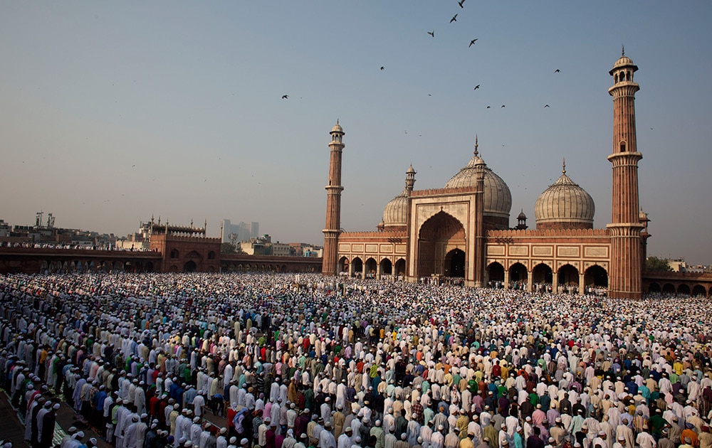 Muslims offer prayers to mark the festival of Eid al-Adha at Jama Masjid in New Delhi.