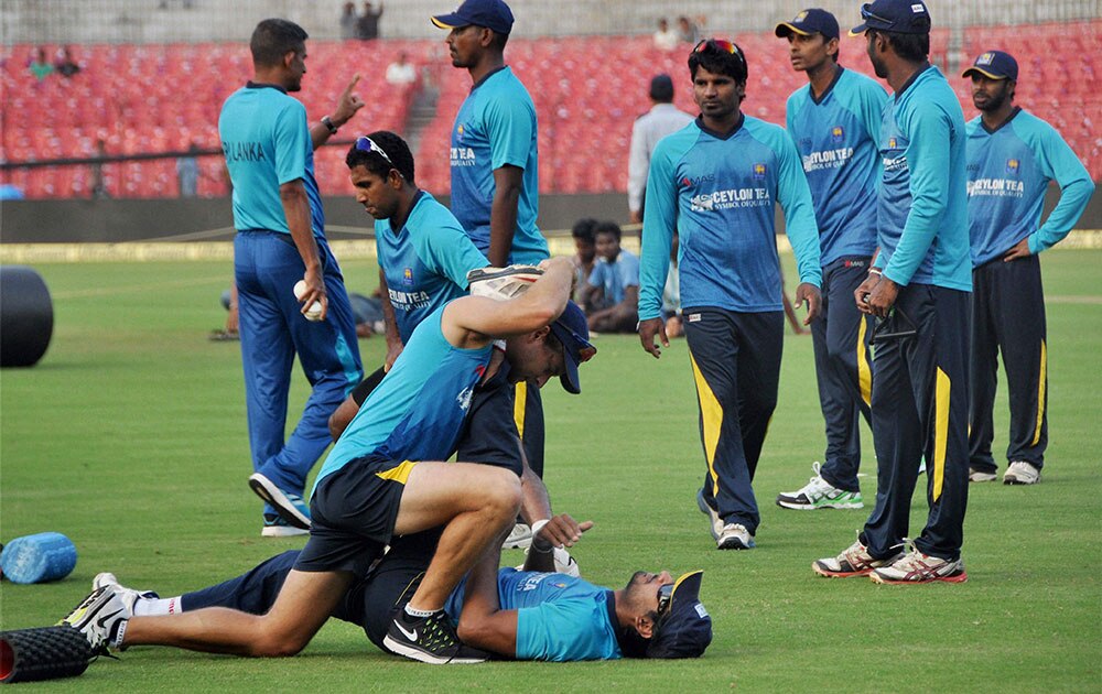Sri Lankan cricketers during a training session at Barabati Stadium in Cuttack.
