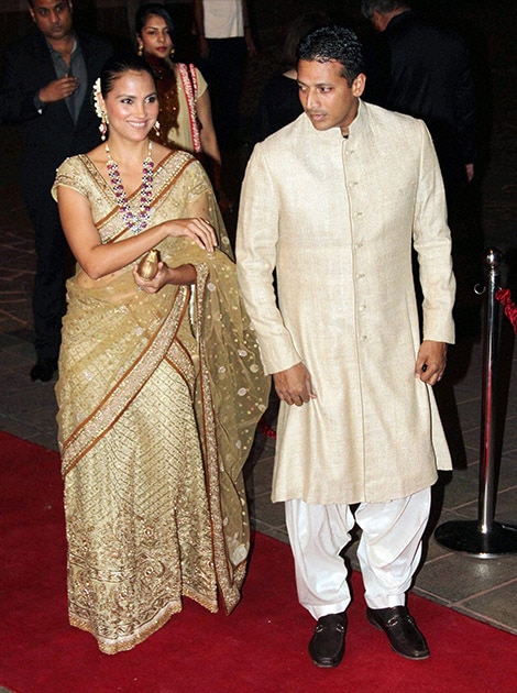 Bollywood actress Lara Dutta with husband Mahesh Bhupati during wedding reception of Arpita Khan in Mumbai.