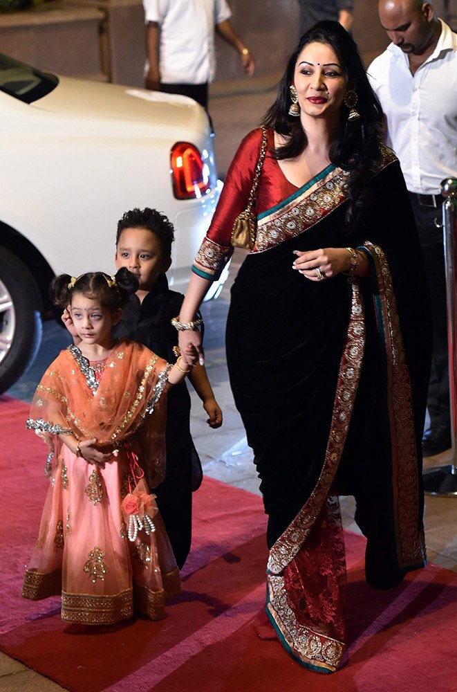Bollywood actor Sanjay Dutts wife Manyata with kids attend Arpita Khan and Aayush Sharma wedding reception in Mumbai.