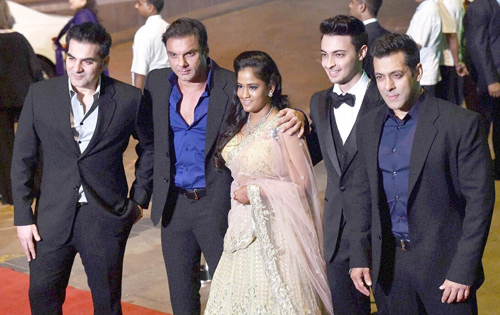 Bollywood actor Salman Khan along with brother Arbaz, Sohail, sister Arpita and her husband Aayush Sharma during the Arpita Khan wedding reception in Mumbai.