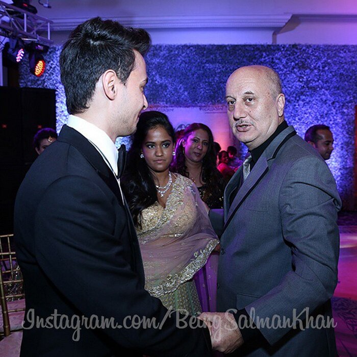 Arpita and Aayush with veteran actor Anupam Kher.