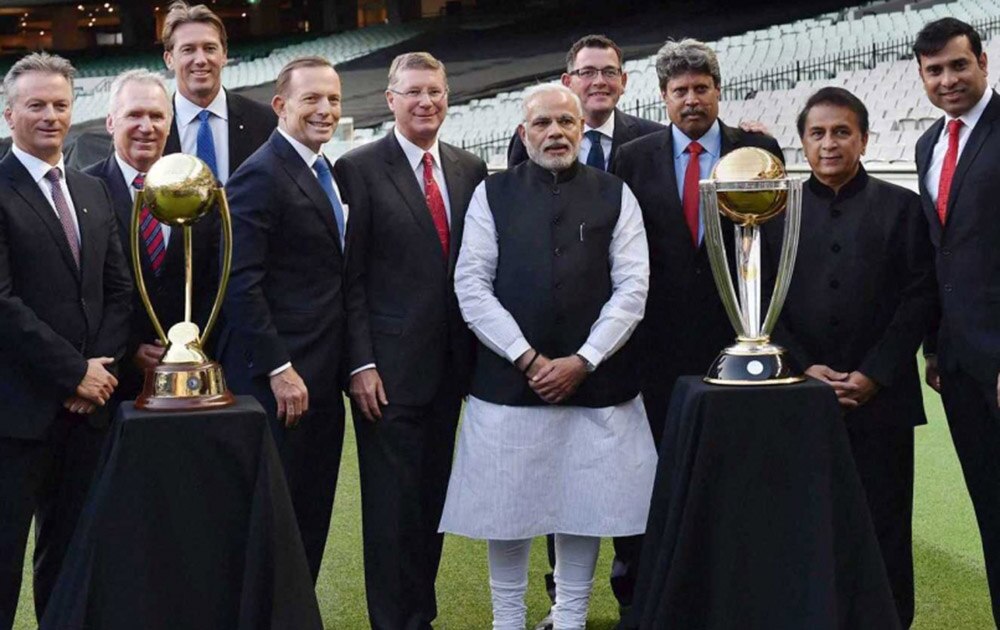 Australia PM Tony Abbott (5th from left) and Indian PM Narendra Modi (6th from left) with legendary cricketers and the World Cup 2015 trophy at the Melbourne Cricket Ground.
