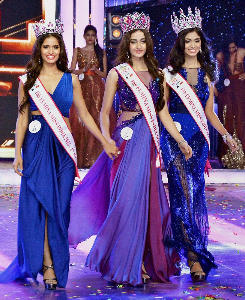 Aditi Arya, winner of Femina Miss India World 2015 with Vartika Singh, second runner-up and Afreen Racheal Vaz, first runner-up, during the Grand Finale, in Mumbai.
