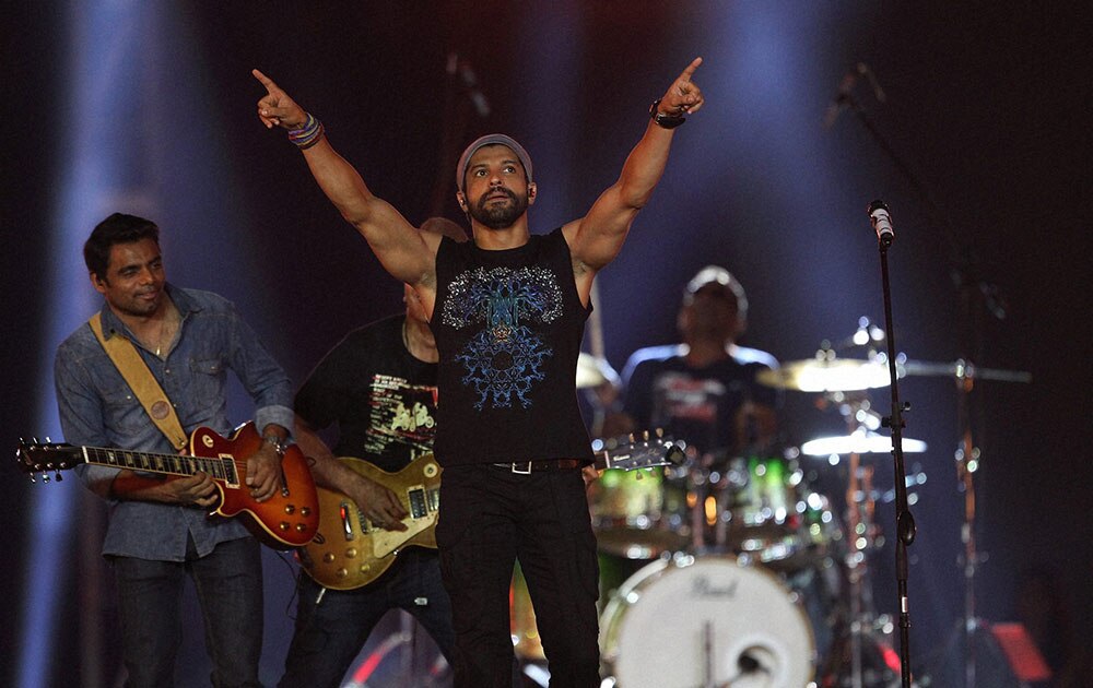 Bollywood Actor Farhan Akhtar performs during the Pepsi IPL 2015 opening night event at the Salt Lake Stadium in Kolkata.
