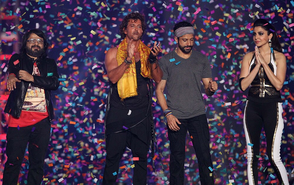 Pritam, Hritik, Farhan Akhtar and Anushka Sharma during the Pepsi IPL 2015 opening night event at the Salt Lake Stadium in Kolkata.
