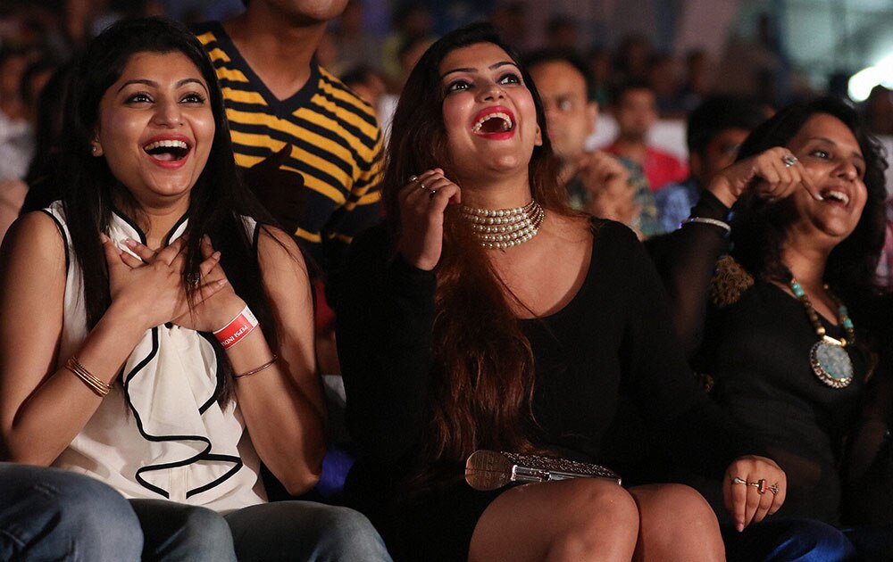 Fans during the Pepsi IPL 2015 opening night event at the Salt Lake Stadium in Kolkata.
