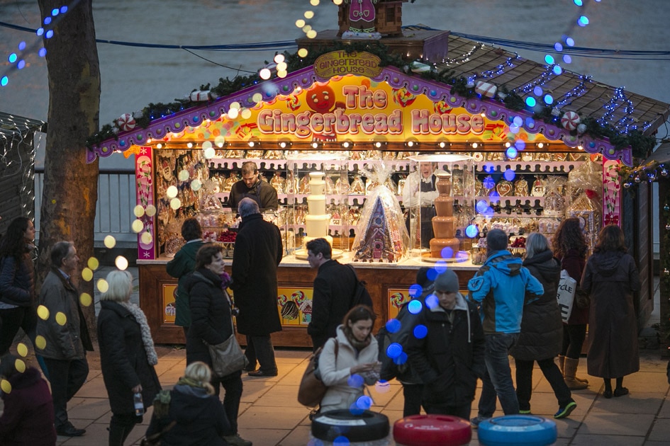 Festive crowds walk through the German Christmas Market