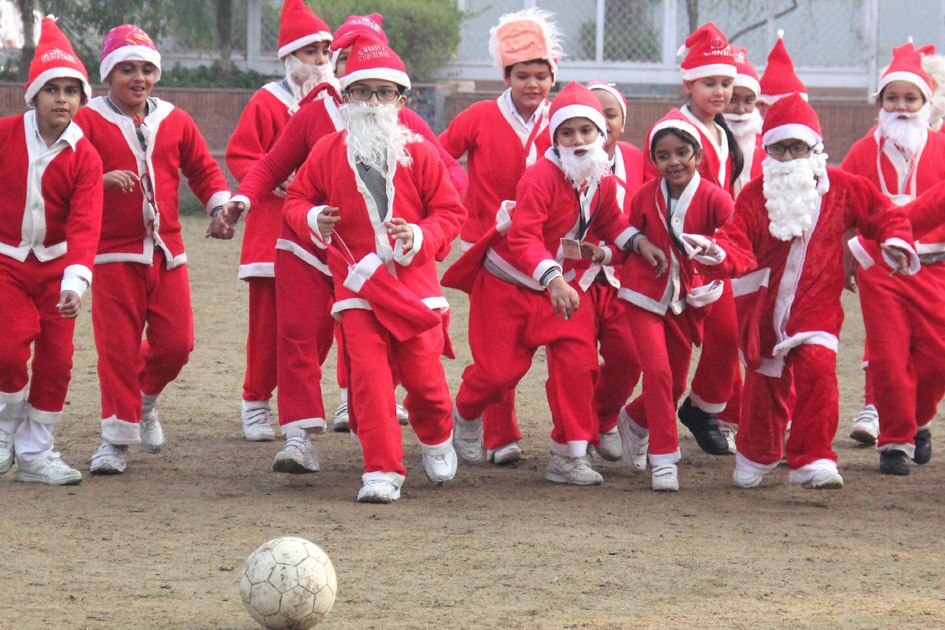 Children dressed as Santa Clau
