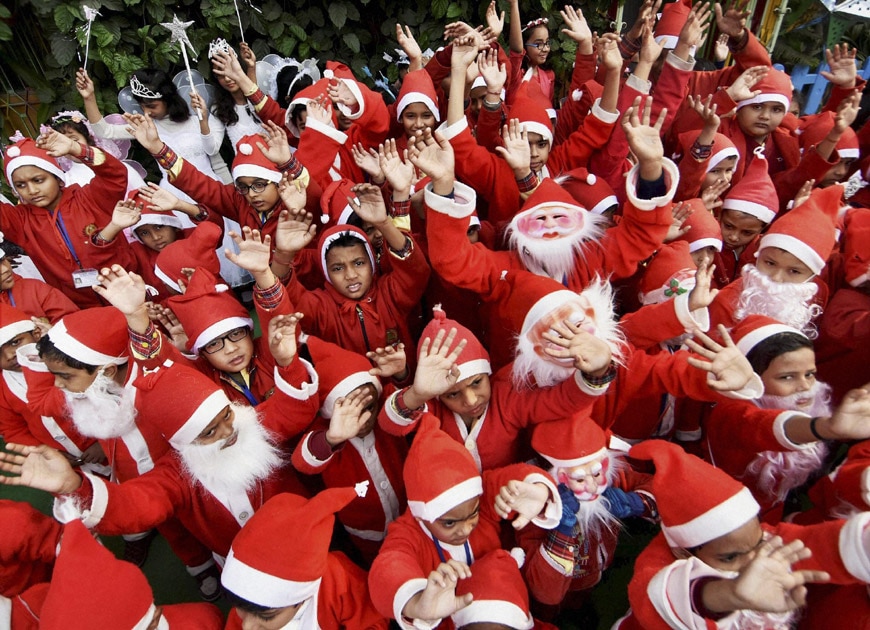 School children dress up as Santa Clau