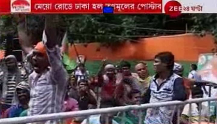 অমিত শাহের সভাস্থলে তৃণমূলের পোস্টার, রাস্তার দু&#039;ধার কাপড় দিয়ে ঢাকল বিজেপি 