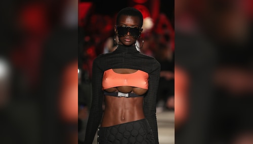 Bizarre but true: Models with three breasts walk the runway at