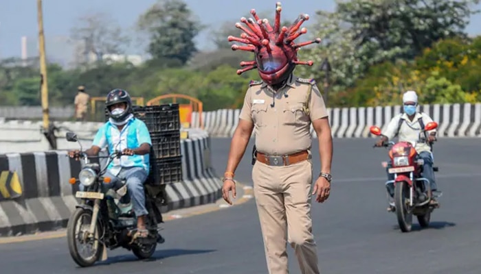 মাথায় &#039;করোনাভাইরাস&#039; নিয়ে রাস্তায় নামল চেন্নাই পুলিস