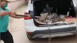 BMW গাড়িতে আবর্জনা বোঝাই করছেন এই ব্যক্তি! কাণ্ড দেখে হা নেটিজেনরা