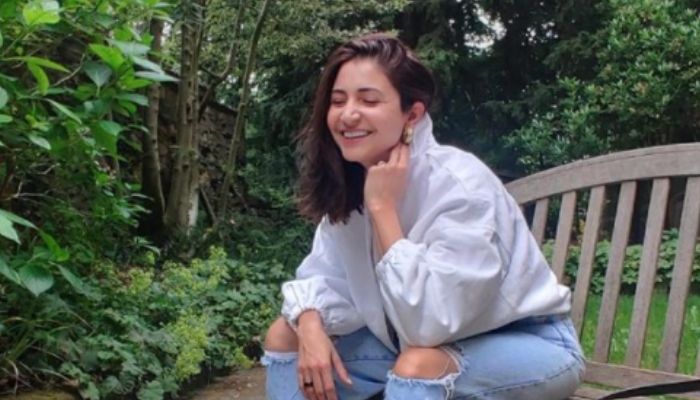 Anushka in Boyfriend Jeans, White T-shirt, White Jacket and Sneakers