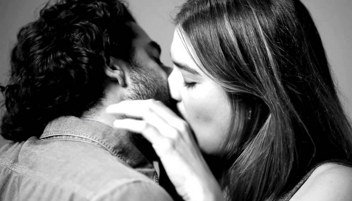 KISSING RELEASES FEEL-GOOD HORMONES.