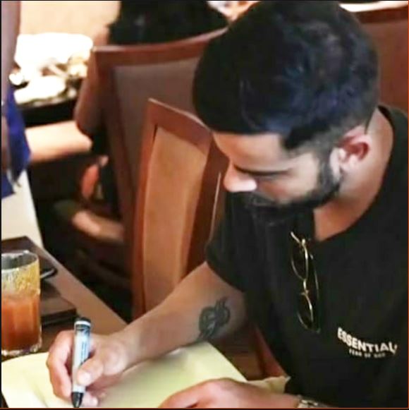 Virat wrote on a porcelain plate