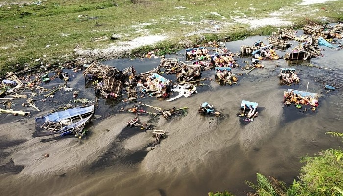 A river heavily polluted after idol immersion in Siliguri