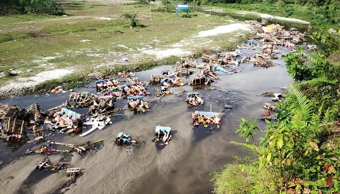 A river heavily polluted after idol immersion in Siliguri