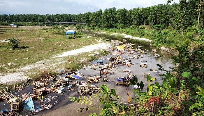 A river heavily polluted after idol immersion in Siliguri