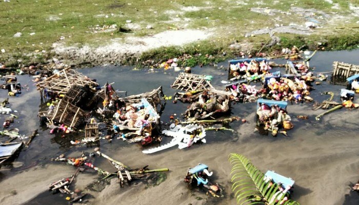 A river heavily polluted after idol immersion in Siliguri