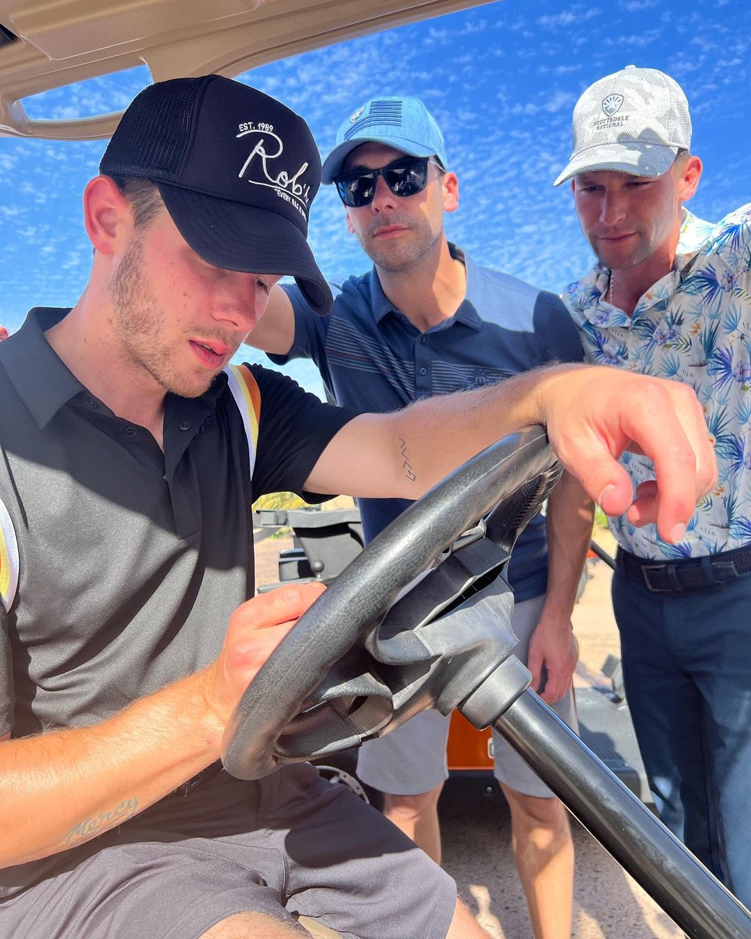 Nick Priyanka playing golf 3