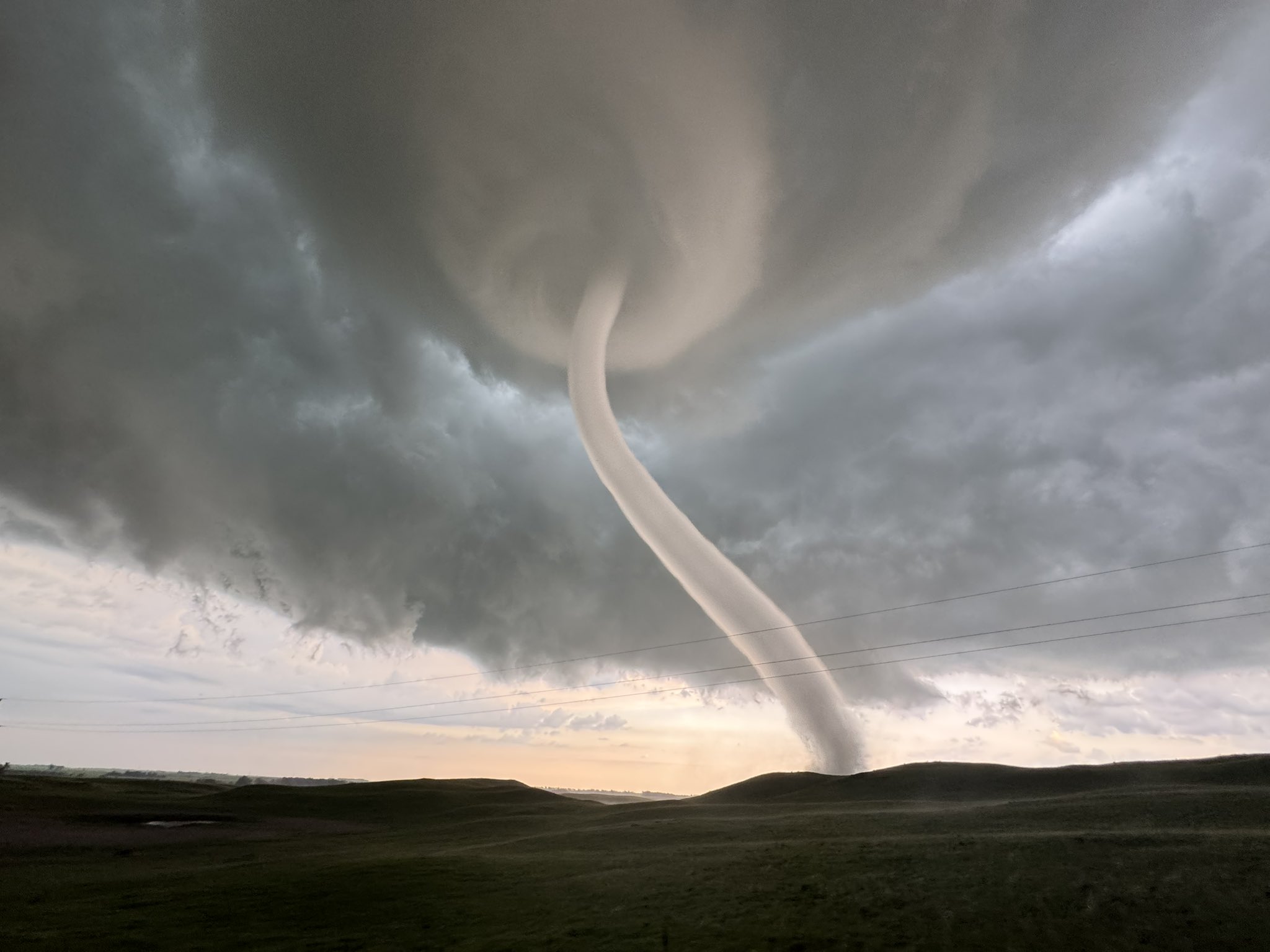 Viral Proposal in front of Tornado and Active Volcano