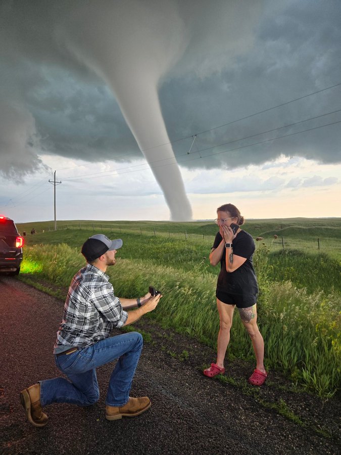 Viral Proposal in front of Tornado and Active Volcano