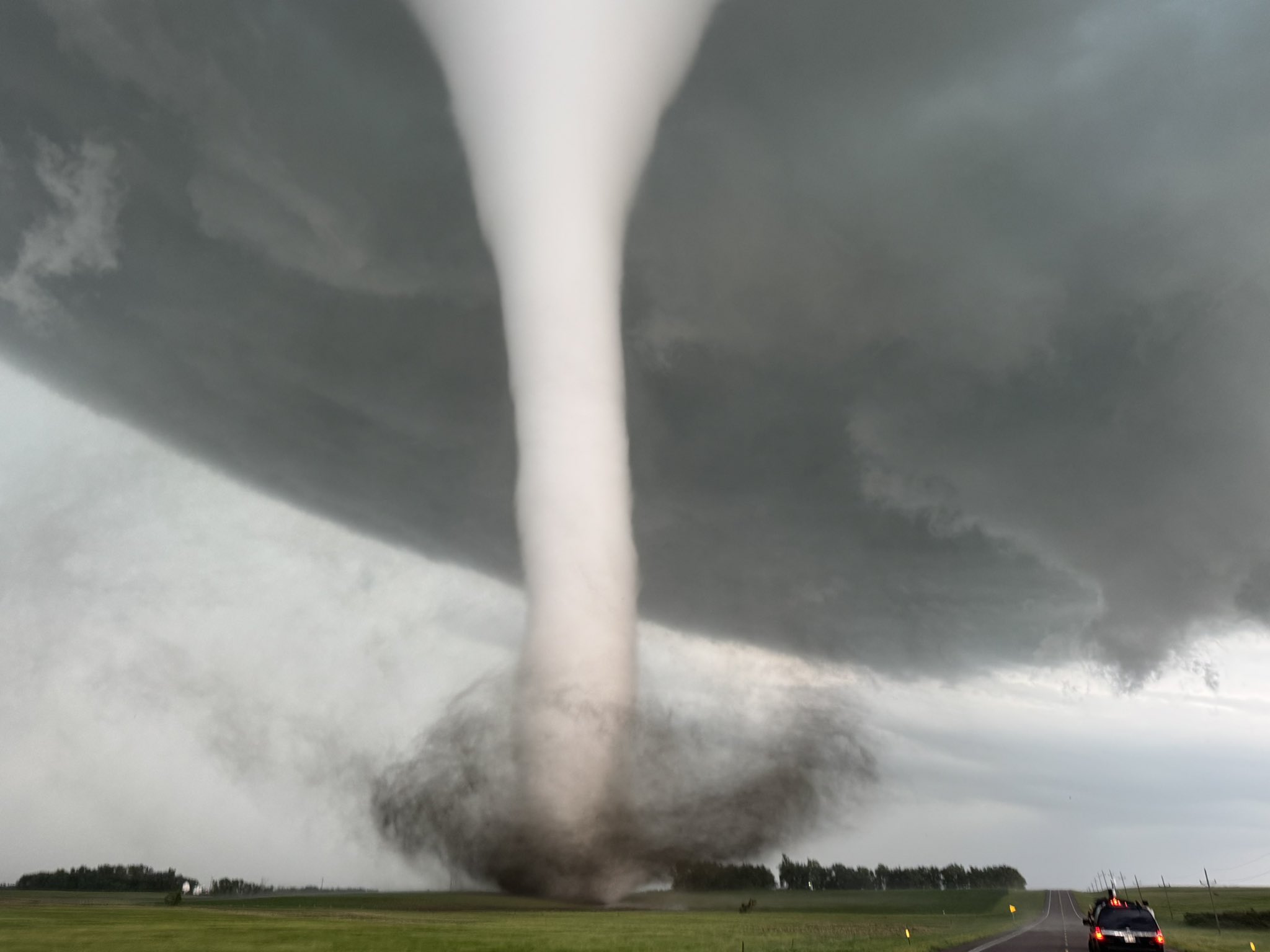 Viral Proposal in front of Tornado and Active Volcano