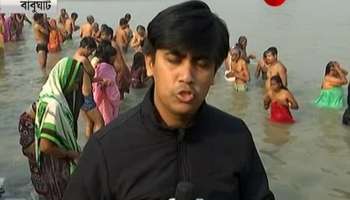 Police keeps a constant eye as devotees gather up at Babughat to celebrate Makar Sankranti