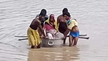 রান্নার বাসনে চেপে নদী পার! হাসপাতাল পৌঁছতে 'যুদ্ধ' করলেন গর্ভবতী মহিলা