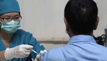 চিনের Sinopharm-র দু'টি টিকাই Covid-19 রুখবে, জানাল মার্কিন মেডিক্যাল জার্নাল