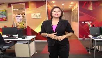 Suvendu protests in a march with a picture of Rabindranath around his neck in protest  