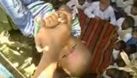 অনেক উপর থেকে ছুঁড়ে দেওয়া হয় শিশুদের, ভাগ্য আছে যার সেই বাঁচবে, এটাই ধর্মীয় রীতি (ভিডিও)