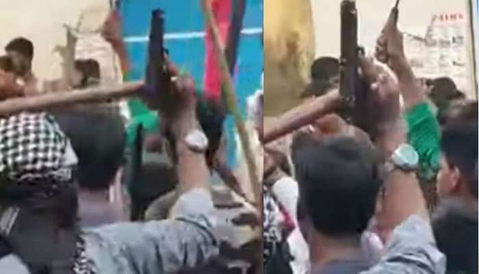 ভিডিয়ো: মালদহে থানার সামনে পিস্তল হাতে তাজিয়া, এটা খেলনা, দাবি পুলিসের ভিডিয়ো: মালদহে থানার সামনে পিস্তল হাতে তাজিয়া, এটা খেলনা, দাবি পুলিসের
