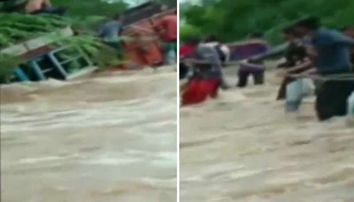 ভিডিয়া: বন্যার জলে ভেসে গেল পড়ুয়া ভর্তি ট্রাক, গ্রামবাসীদের সাহসিকতায় বাঁচল প্রাণ