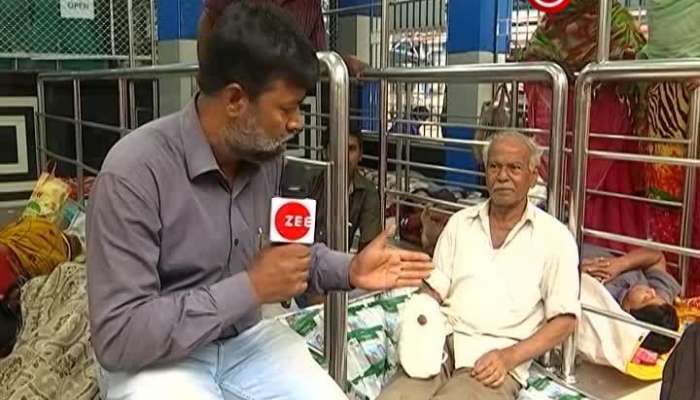 Old man waiting for treatment in front of medical superintendent's office in Kolkata