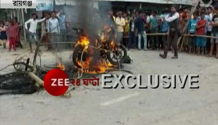 Mob lits bike on fire at Gourigram of Raiganj