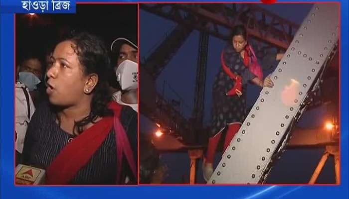 Lady climbs howrah bridge in protest