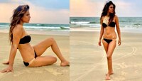 গোয়ার সৈকতে কালো বিকিনিতে সুপার Hot 'নাগিন' নিয়া শর্মা