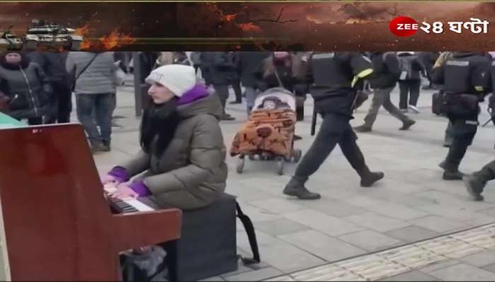 Ukraine Russia War: A young woman playing the piano on the battlefield ukraine