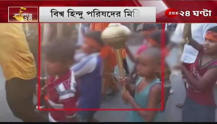 Weapons in the hands of children during the Ramnabami procession in Chuchura
