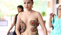 মিলিন্দ সোমানকে মনে করালেন উর্ফি, গায়ে সাপ জড়িয়ে ধরা দিলেন ক্যামেরায়