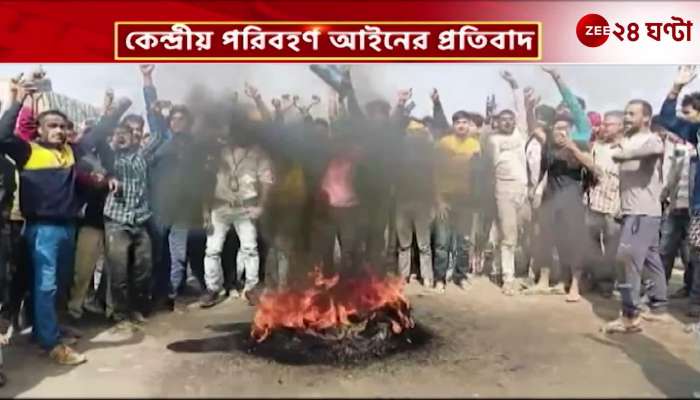 Truck drivers protest by burning tires on the national highway