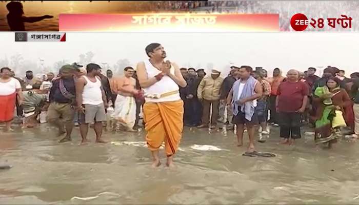 Sujit Bose minister takes holy bath at Gangasagar