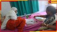 মুখে মাস্ক, হাতে স্যালাইন নিয়ে হাসপাতালে বসেই পরীক্ষা উচ্চমাধ্যমিক পরীক্ষার্থীর!