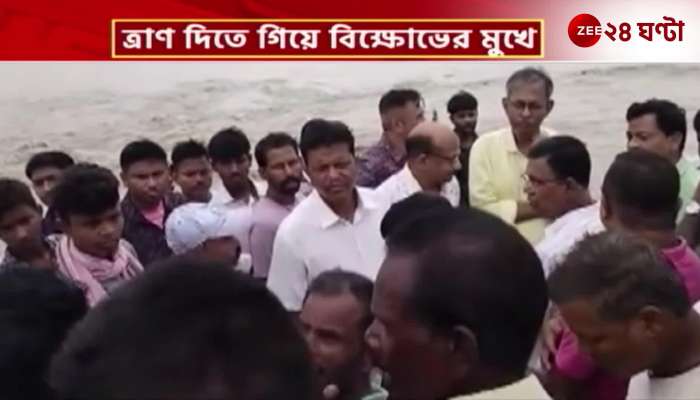 Bulu Chik Baraik faces protests while giving relief in Jalpaiguri 
