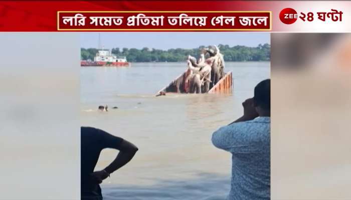 Idol immersed along with the lorry during Vishwakarma Puja procession Stir in Howrah